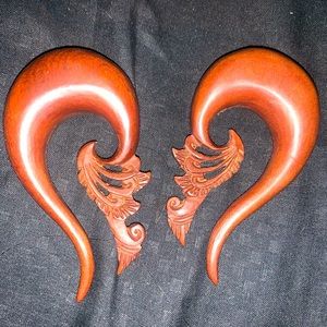 Never worn real handcrafted hand carved wood size 00 hangers